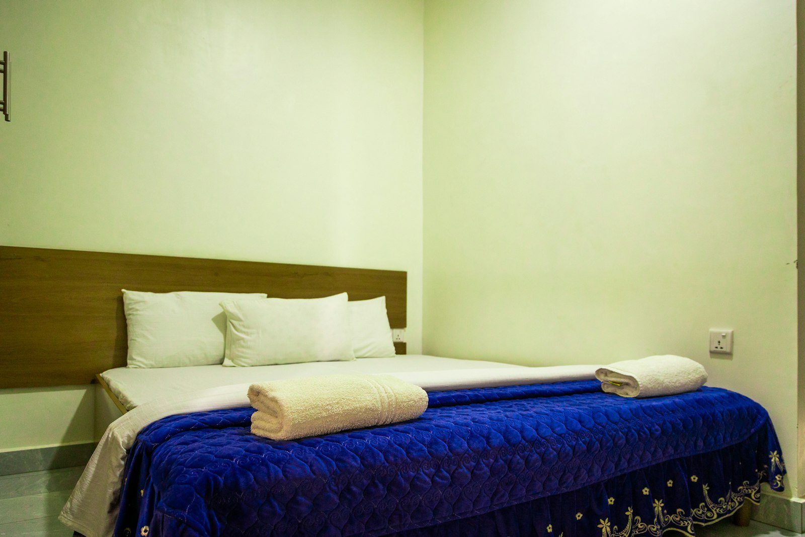 Simple clean hotel bedroom for economy accommodation