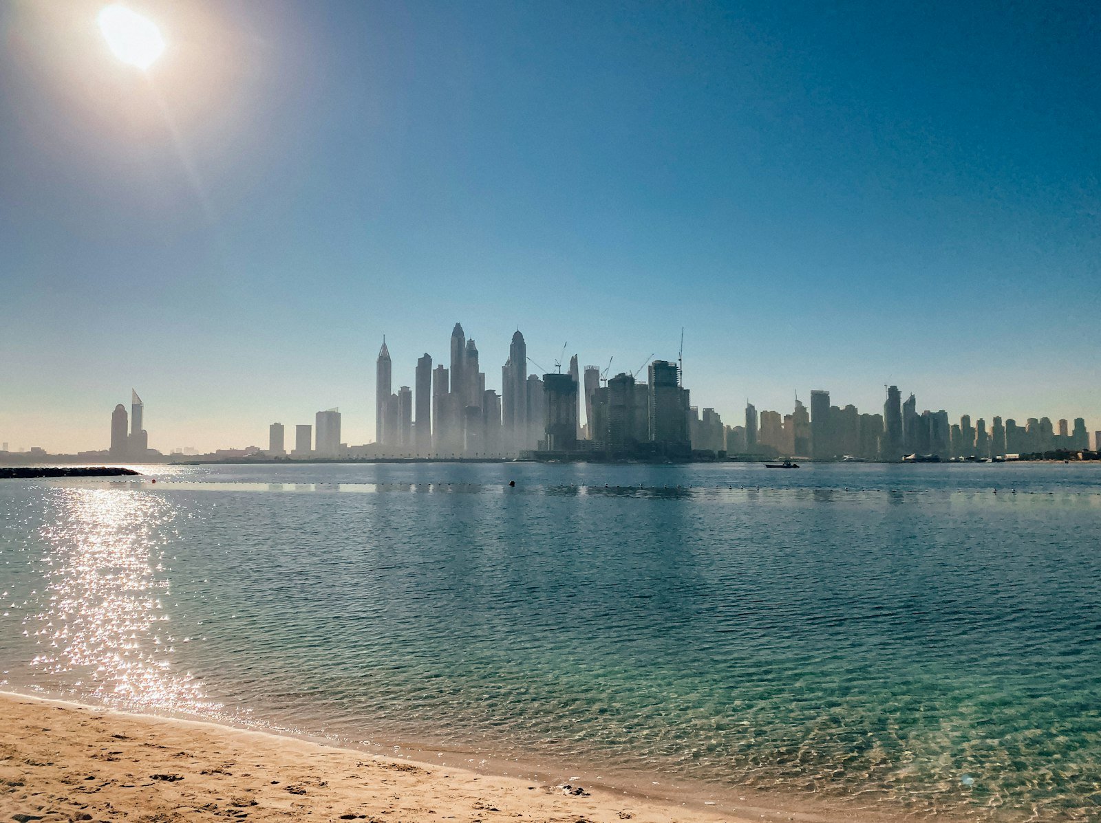 Sunny waterfront view of Palm Jumeirah in Dubai